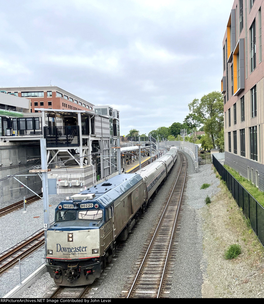 MBTAs Lowell Line, also used by Amtrak Downeaster Trains as far north as Wilmington, parallels the Medford/Tufts Branch of the Green Line. Amtrak Downeaster Train # 682 with F40 Cabbage Car # 90220 in the lead-picture taken from College Ave overpass